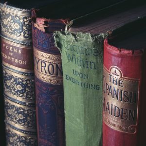 old books sitting on a shelf